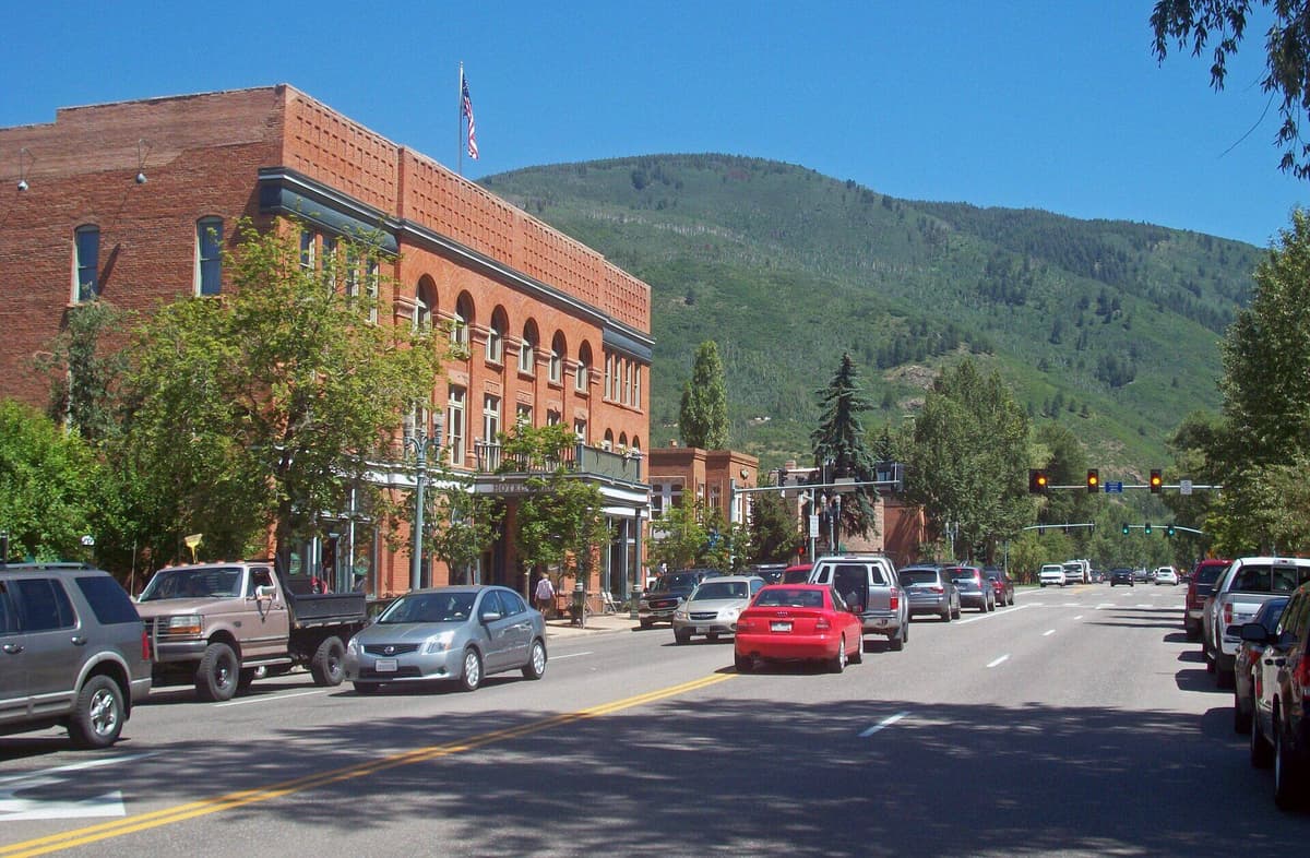 Aspen Colorado downtown with the surrounding mountains in late spring