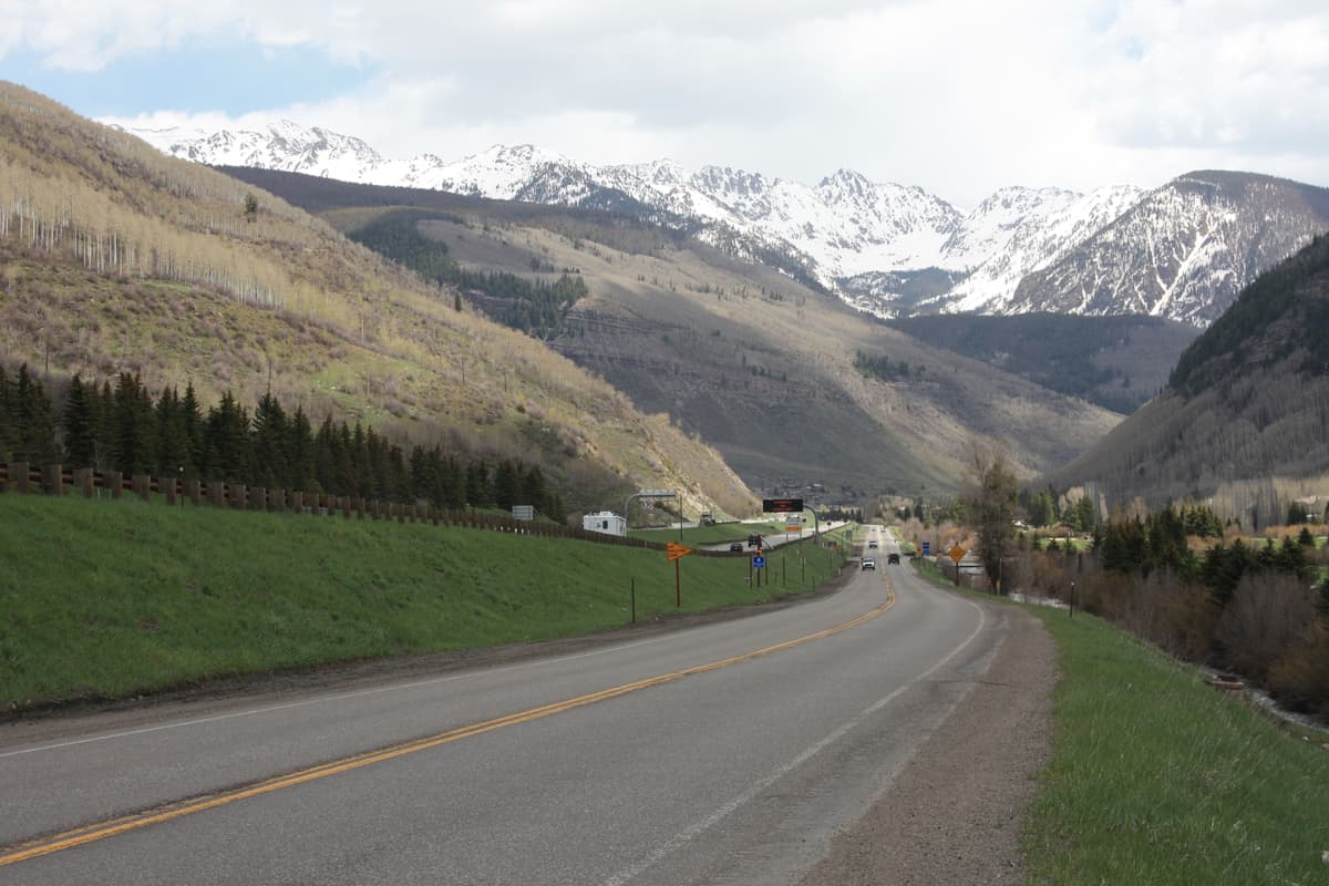 The Gore Range rising above Vail, Colorado, the mountains the Booth Falls Trail climbs toward.