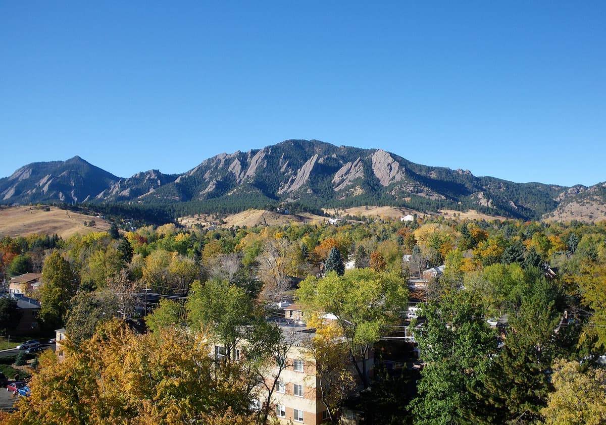 The Flatirons above Boulder, Colorado, glowing in autumn light