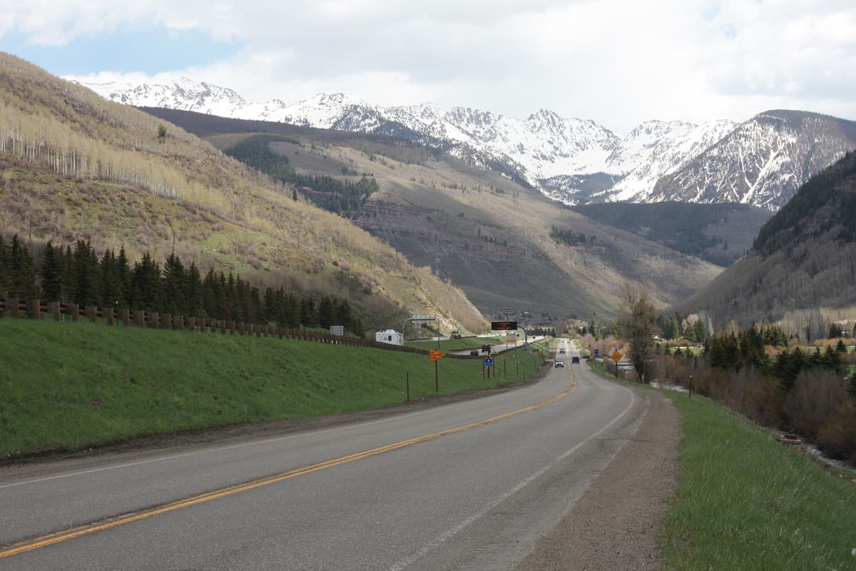 The Gore Range rising above the Vail valley, the same wall of peaks that frames Piney Lake