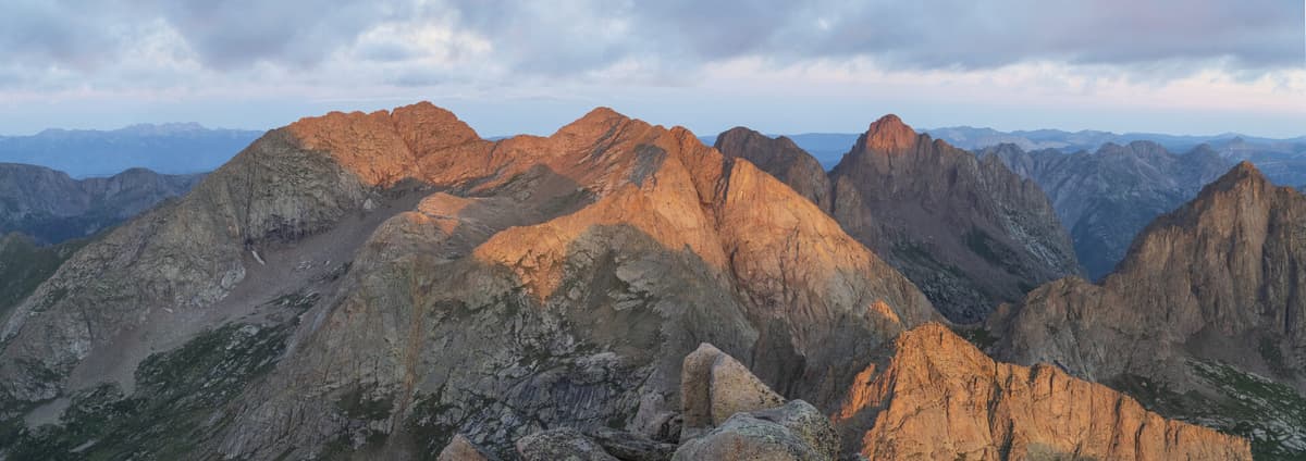 Alpenglow lighting the Eolus peaks above Chicago Basin at dawn