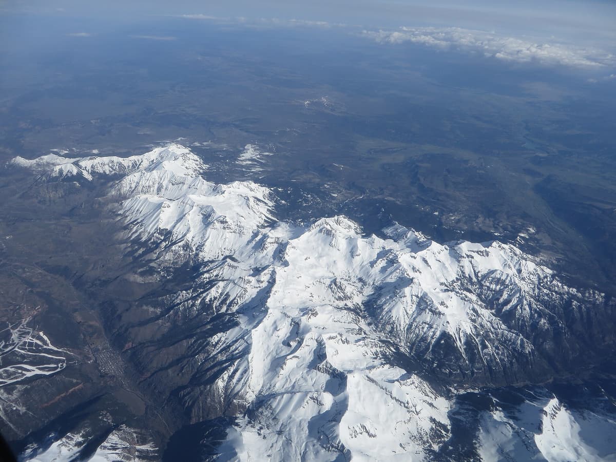 Mount Sneffels rising above the San Juan Mountains, a Class 3 fourteener with a committing summit scramble