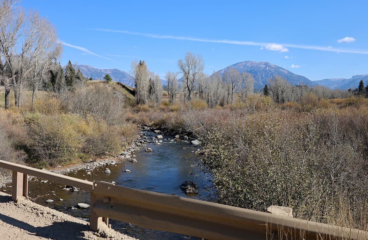 The Piedra River winding through the San Juan National Forest, where free natural hot spring pools sit along the bank