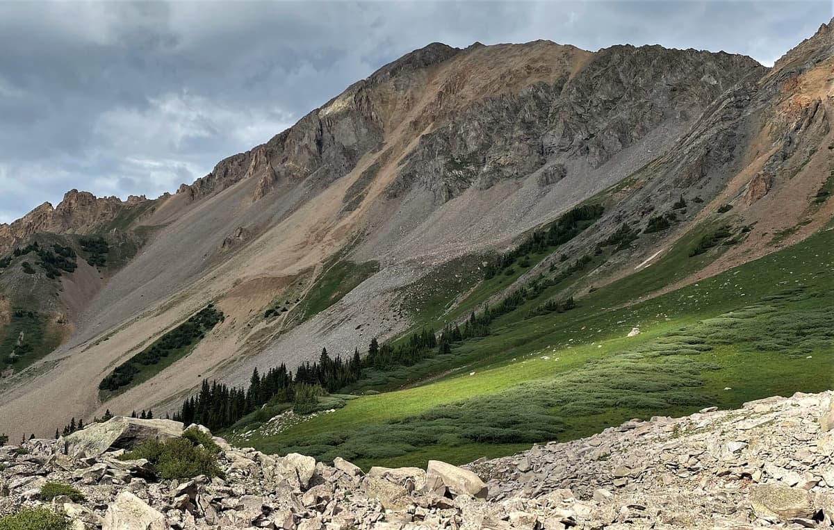 Mount Daly and the high peaks of the Maroon Bells-Snowmass Wilderness, the protected range that holds Cathedral Lake