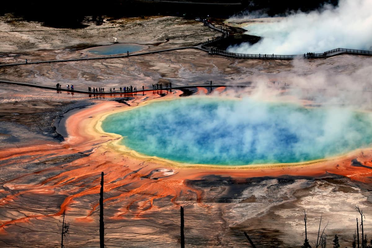 Natural hot spring pool surrounded by mountains