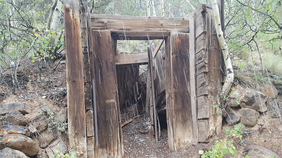 Restored cabins and mine buildings at the Winfield ghost town below Huron Peak