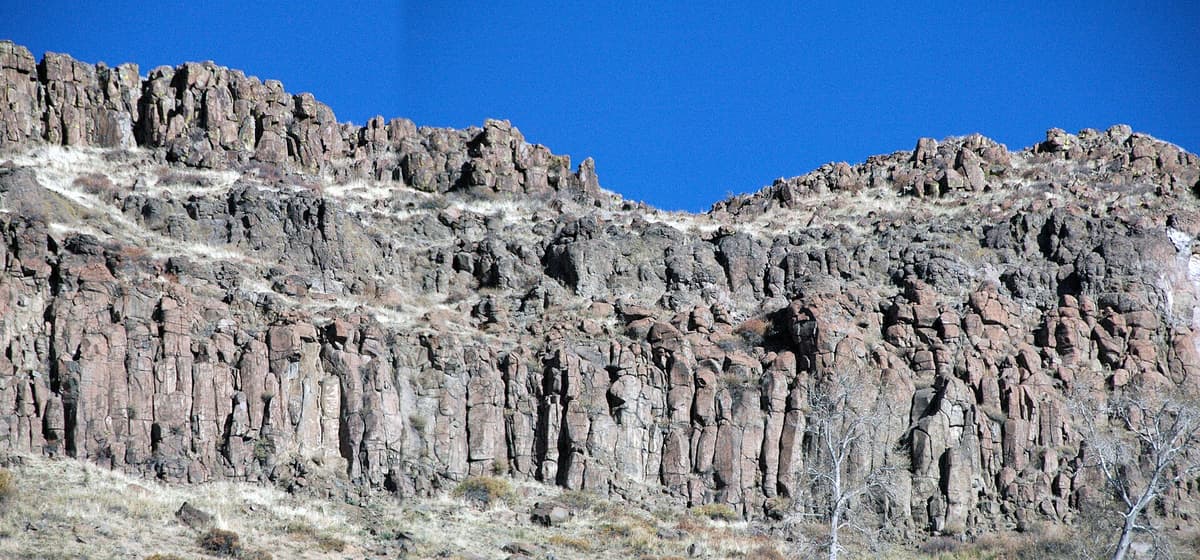 Columnar basalt caprock cliffs along the rim of North Table Mountain near Golden, Colorado