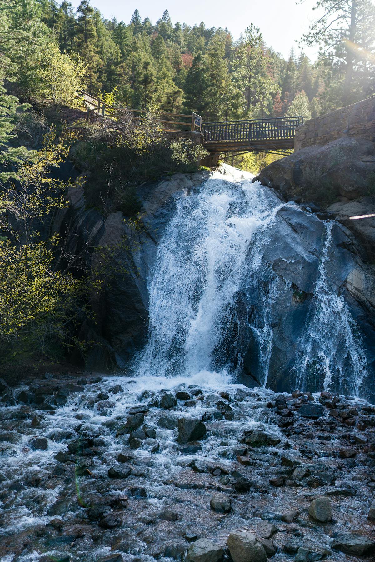 Helen Hunt Falls in Colorado Springs with scenic footbridge